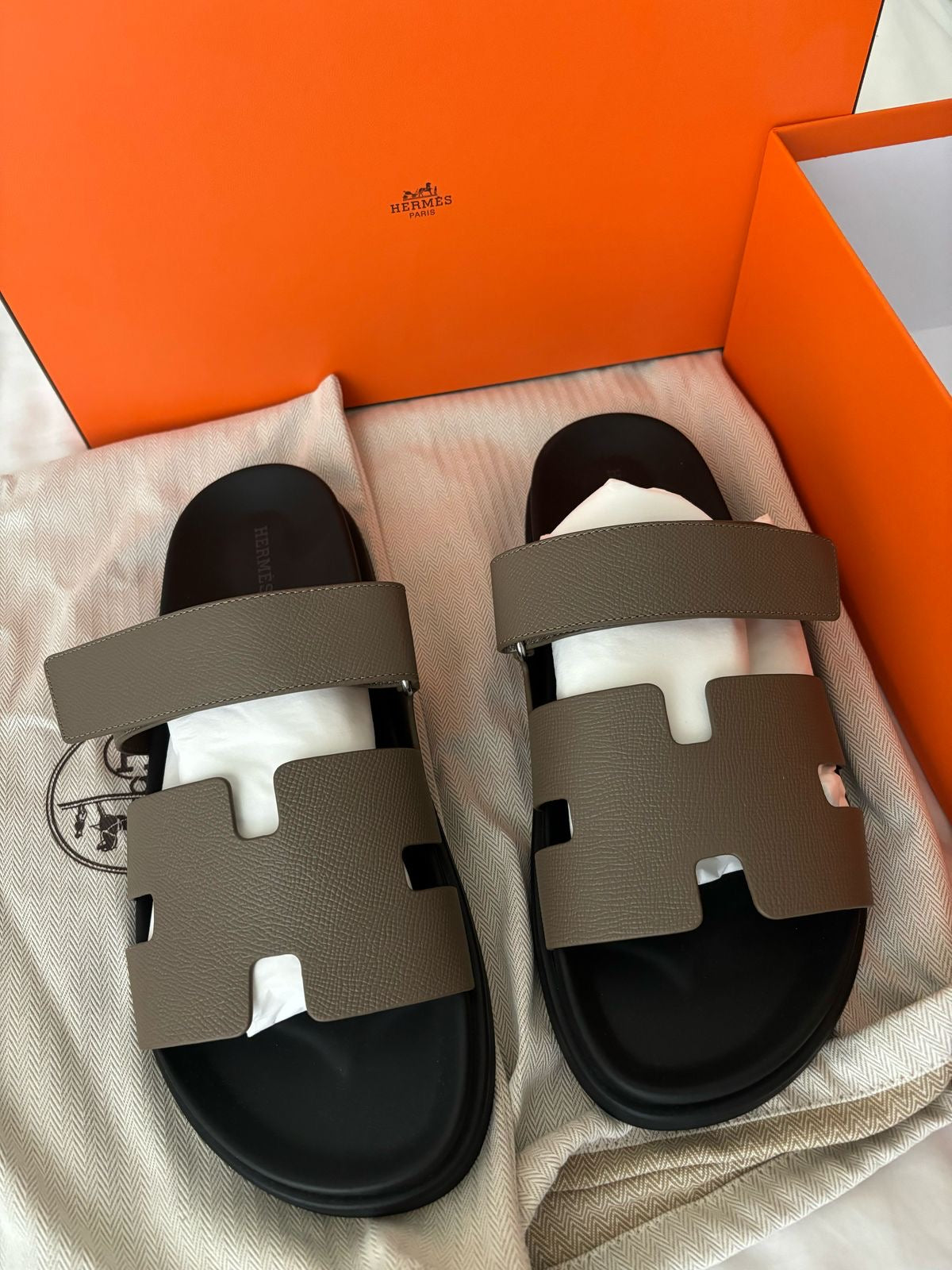 Brand New Hermès Men’s Chypre Sandals – Etoupe & Black | Luxury Leather Slides UAE